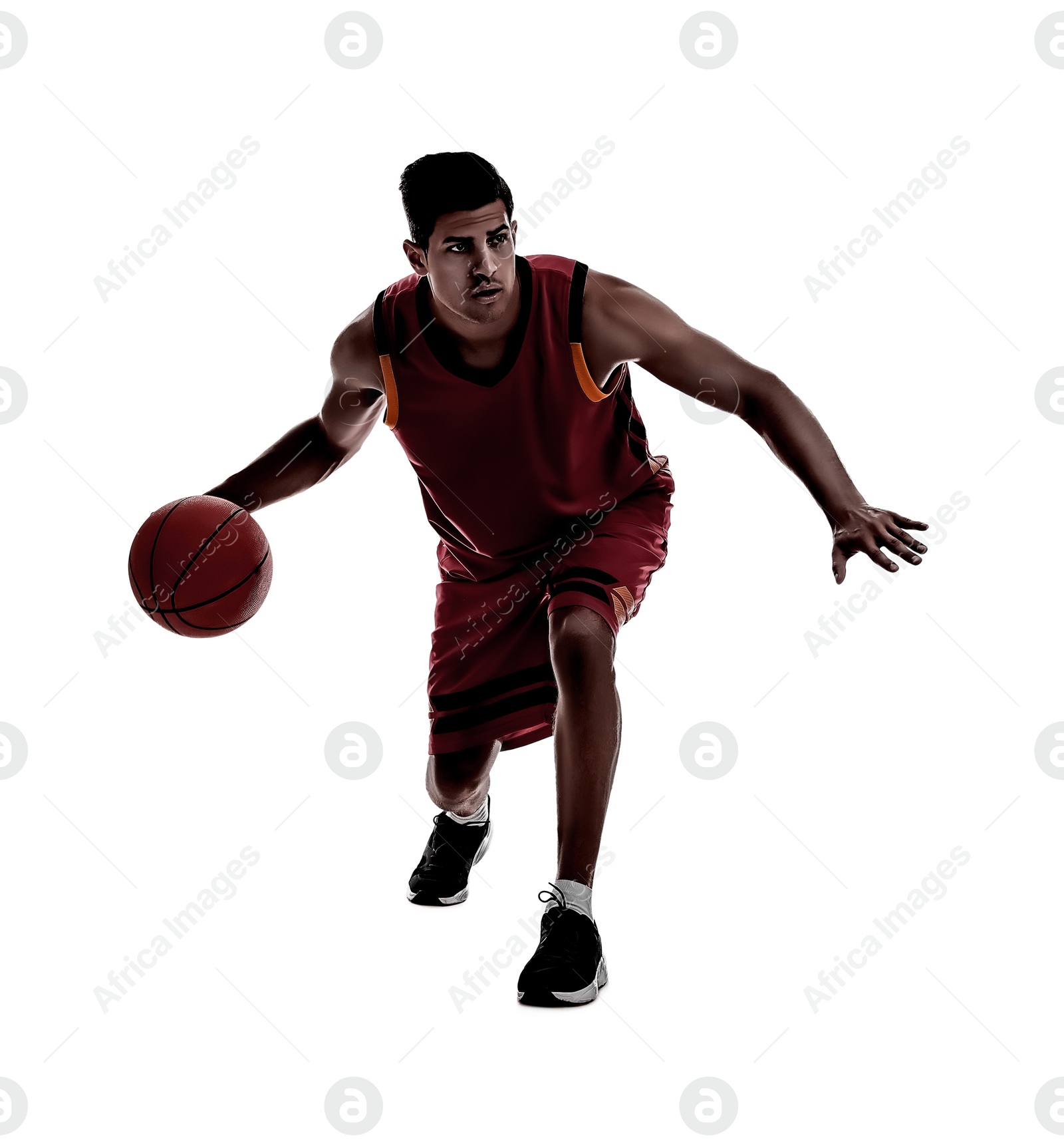 Image of Silhouette of professional sportsman playing basketball on white background