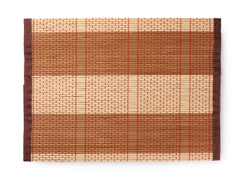 Photo of Sushi mat made of bamboo on white background, top view