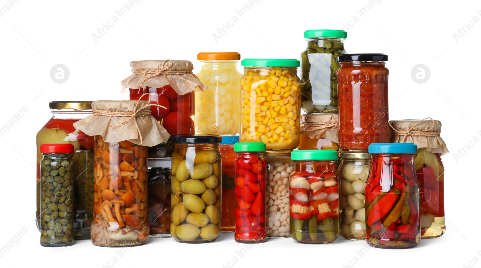 Photo of Different jars with pickled vegetables on white background