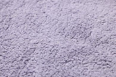 Texture of soft violet fabric as background, closeup