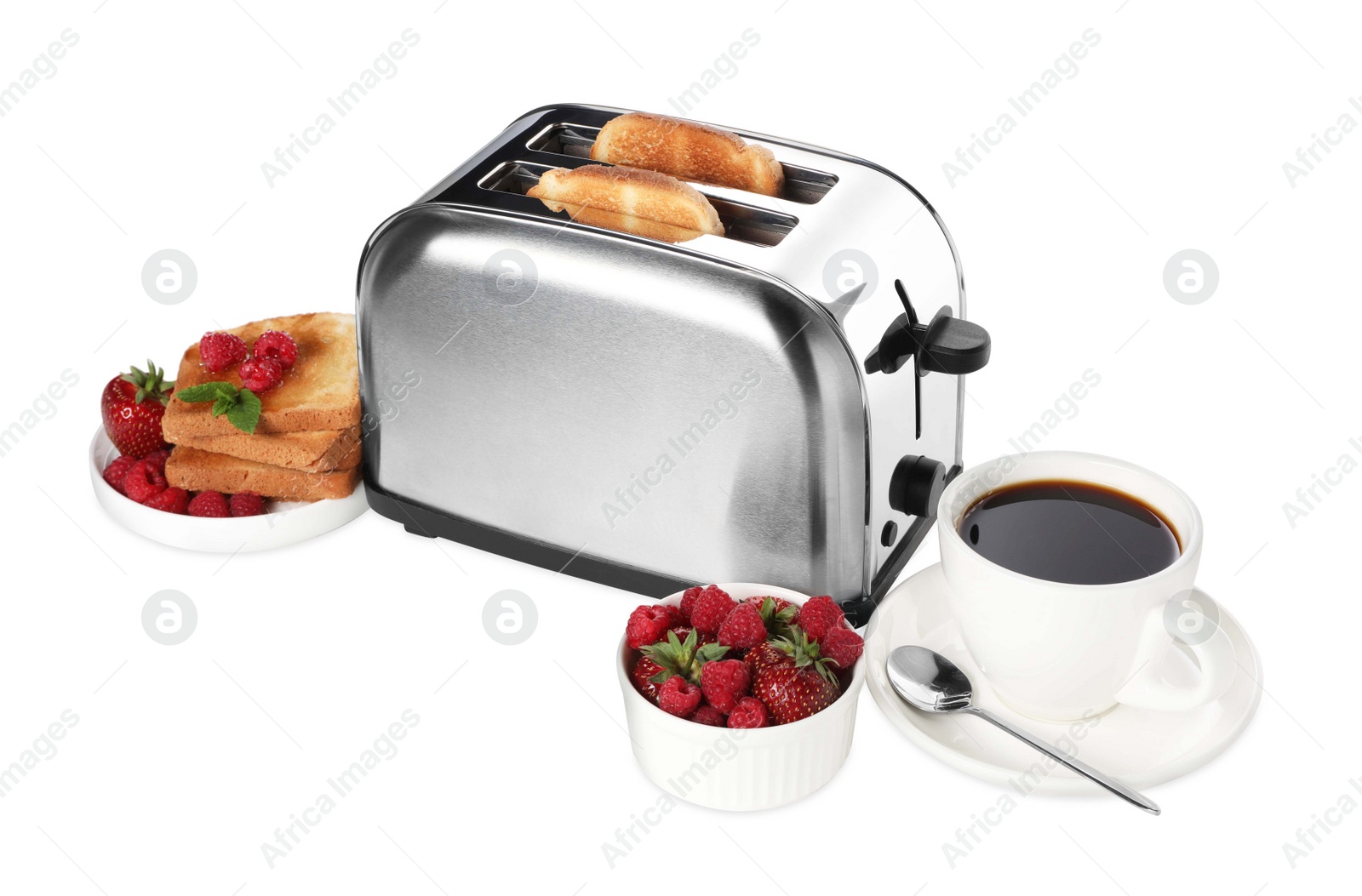 Photo of Toaster with roasted bread, berries and coffee on white background