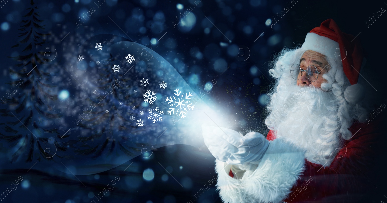 Image of Santa Claus blowing snow in winter forest. Christmas magic. Banner design