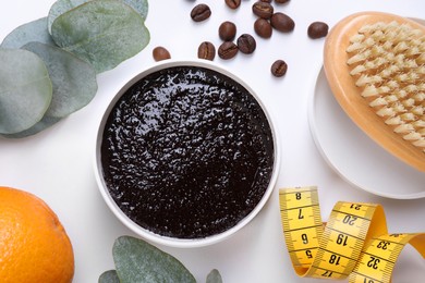 Flat lay composition with natural body scrub on white background. Cellulite treatment