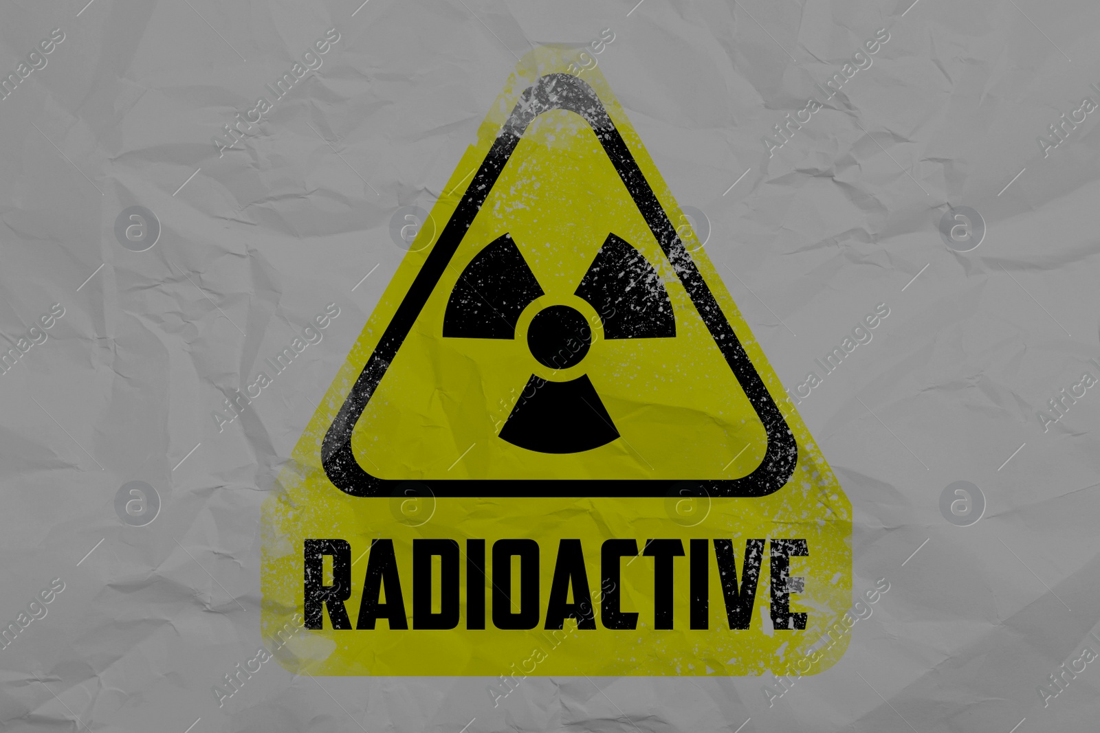 Illustration of Radioactive sign on crumpled white paper. Hazard symbol