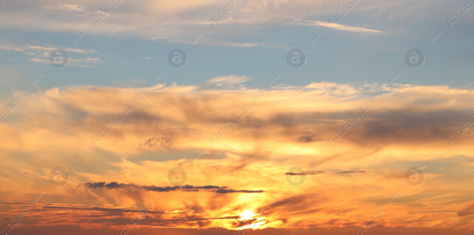 Photo of Picturesque view of beautiful sunset sky with clouds