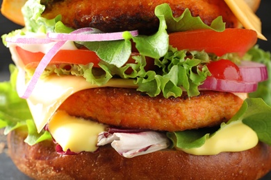 Photo of Double vegetarian burger with carrot cutlets, closeup