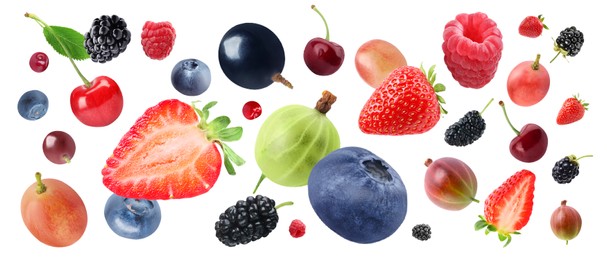 Image of Many different fresh berries falling on white background