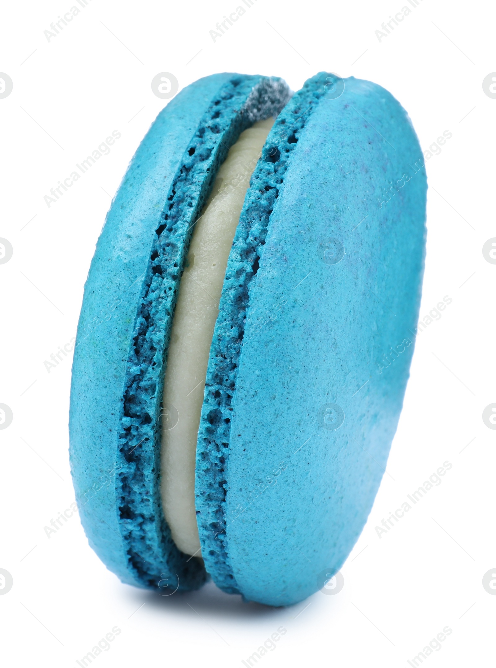 Photo of Light blue macaron isolated on white. Delicious dessert