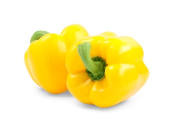 Photo of Ripe yellow bell peppers isolated on white