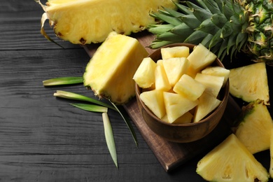 Composition with fresh sliced pineapple on table