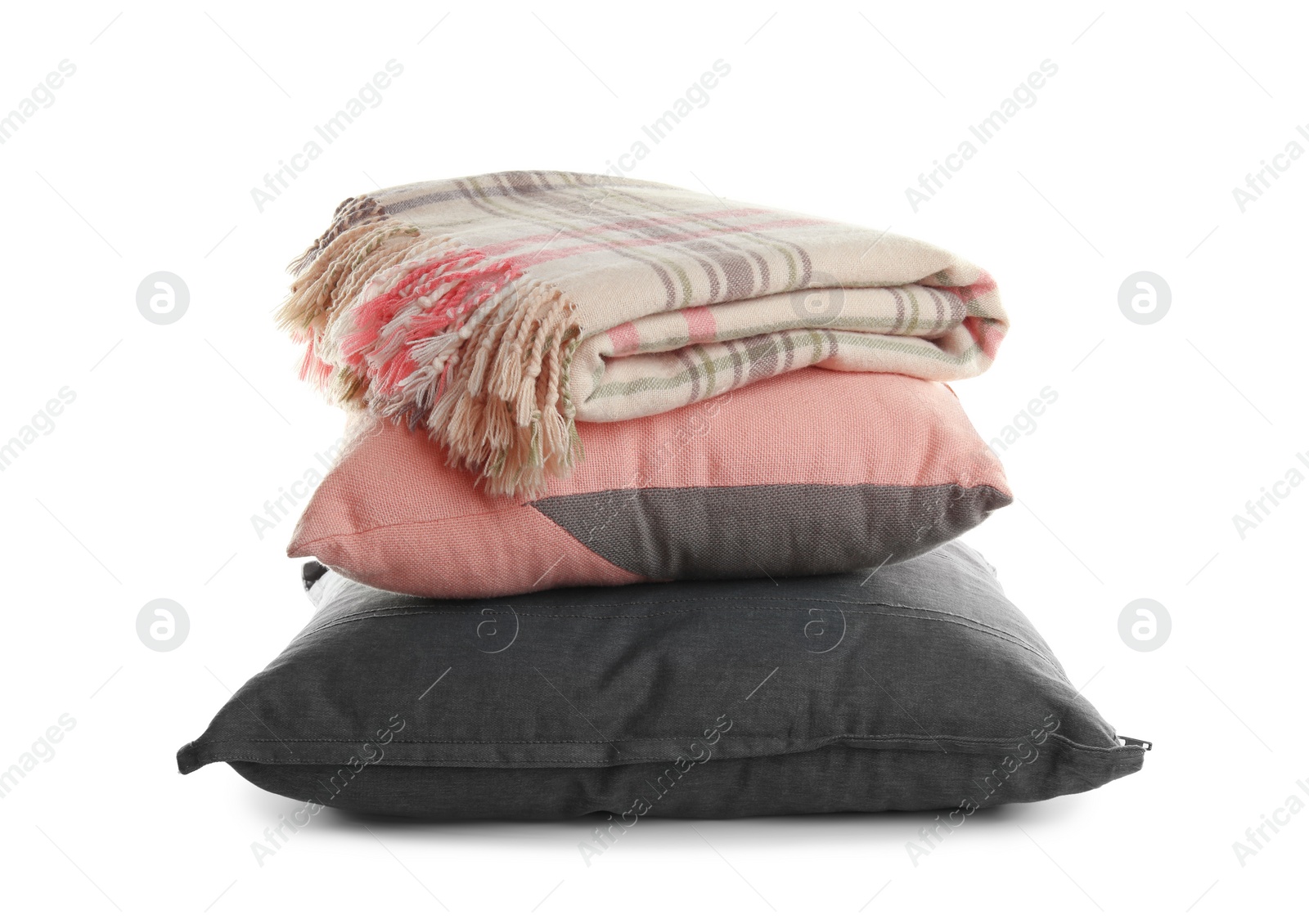 Photo of Stylish soft pillows and folded plaid on white background