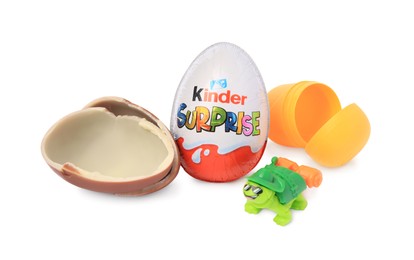 Photo of Slynchev Bryag, Bulgaria - May 24, 2023: Kinder Surprise Eggs, plastic capsule and toy turtle isolated on white