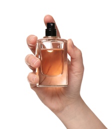Image of Woman with bottle of perfume on white background, closeup