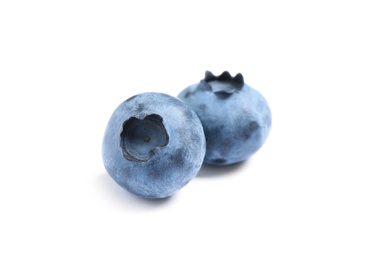 Photo of Delicious fresh ripe blueberries isolated on white