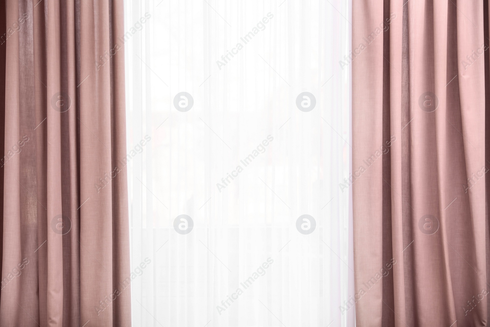 Photo of Window with elegant curtains indoors. Interior element
