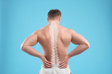 Image of Muscular man on light blue background, back view. Illustration of spine