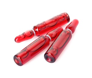 Photo of Glass ampoules with liquid isolated on white, above view