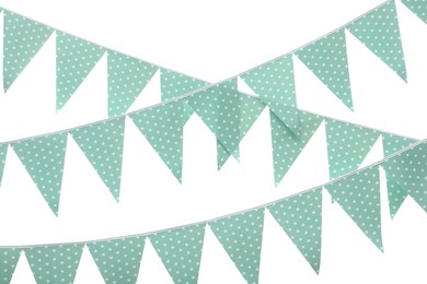 Photo of Rows of triangular bunting flags on white background. Festive decor