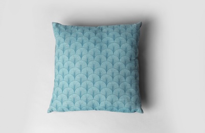 Soft decorative pillow on light background