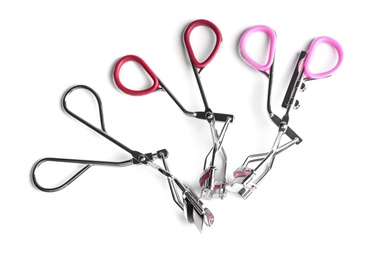 Eyelash curlers on white background