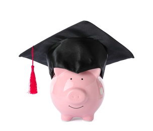 Piggy bank with graduation hat isolated on white