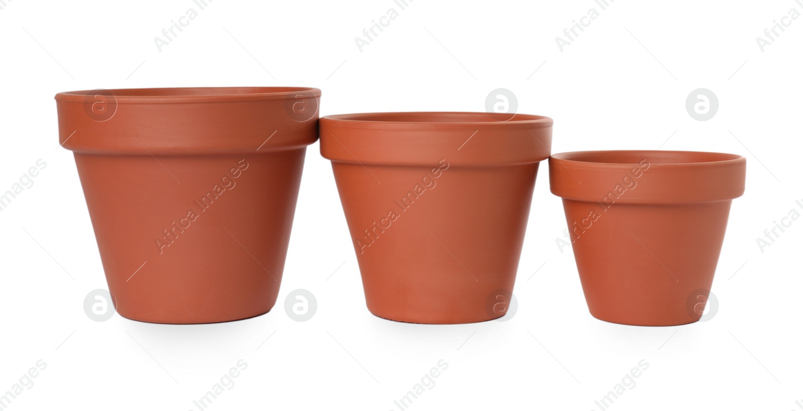 Photo of Empty clay flower pots isolated on white