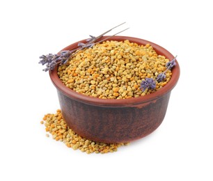 Photo of Fresh bee pollen granules in bowl and lavender isolated on white