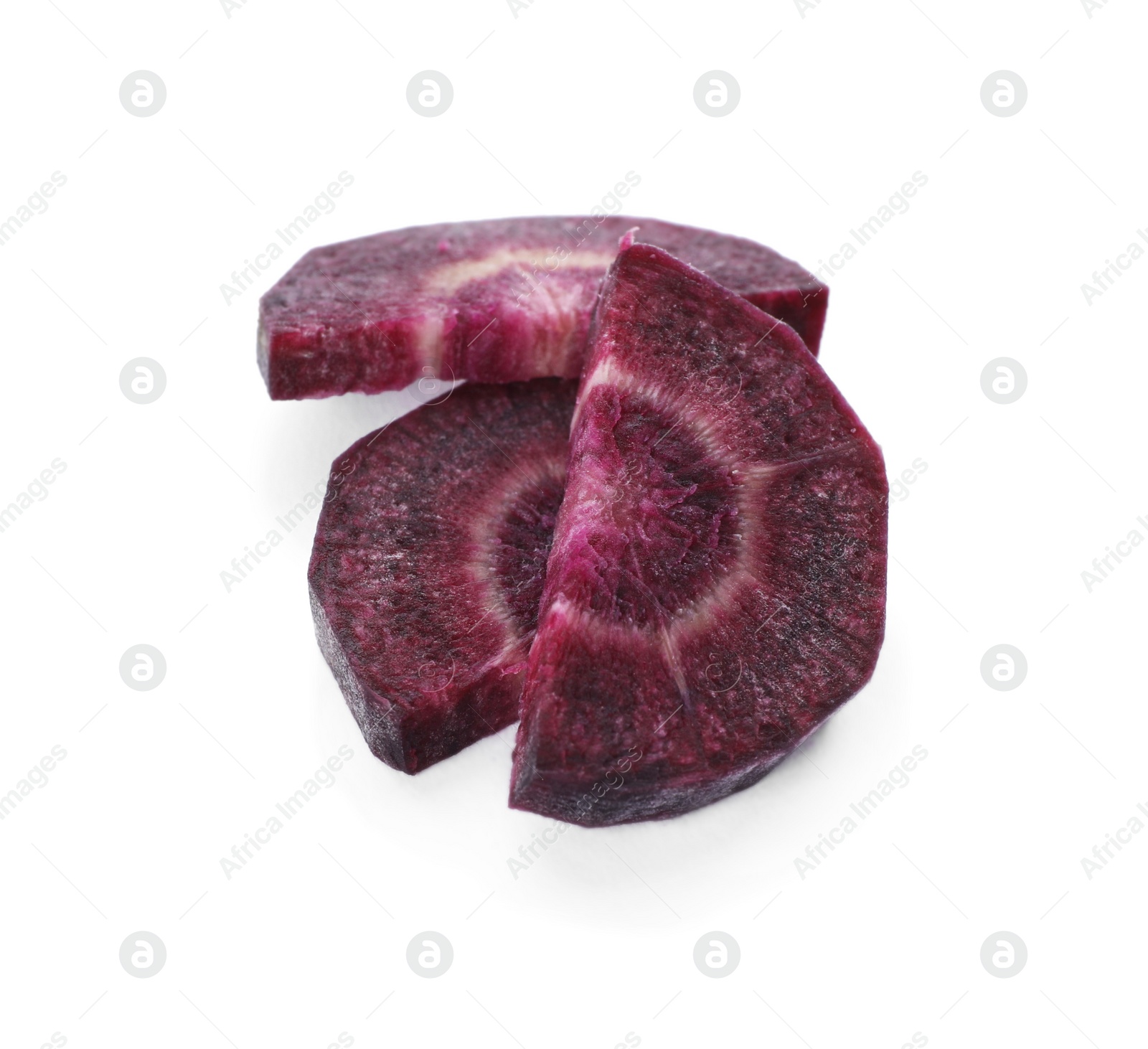 Photo of Slices of raw purple carrot isolated on white