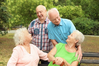 Elderly people spending time together in park