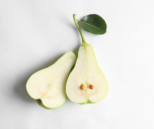 Photo of Sliced ripe pear on white background