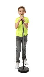 Photo of Cute boy singing in microphone on white background