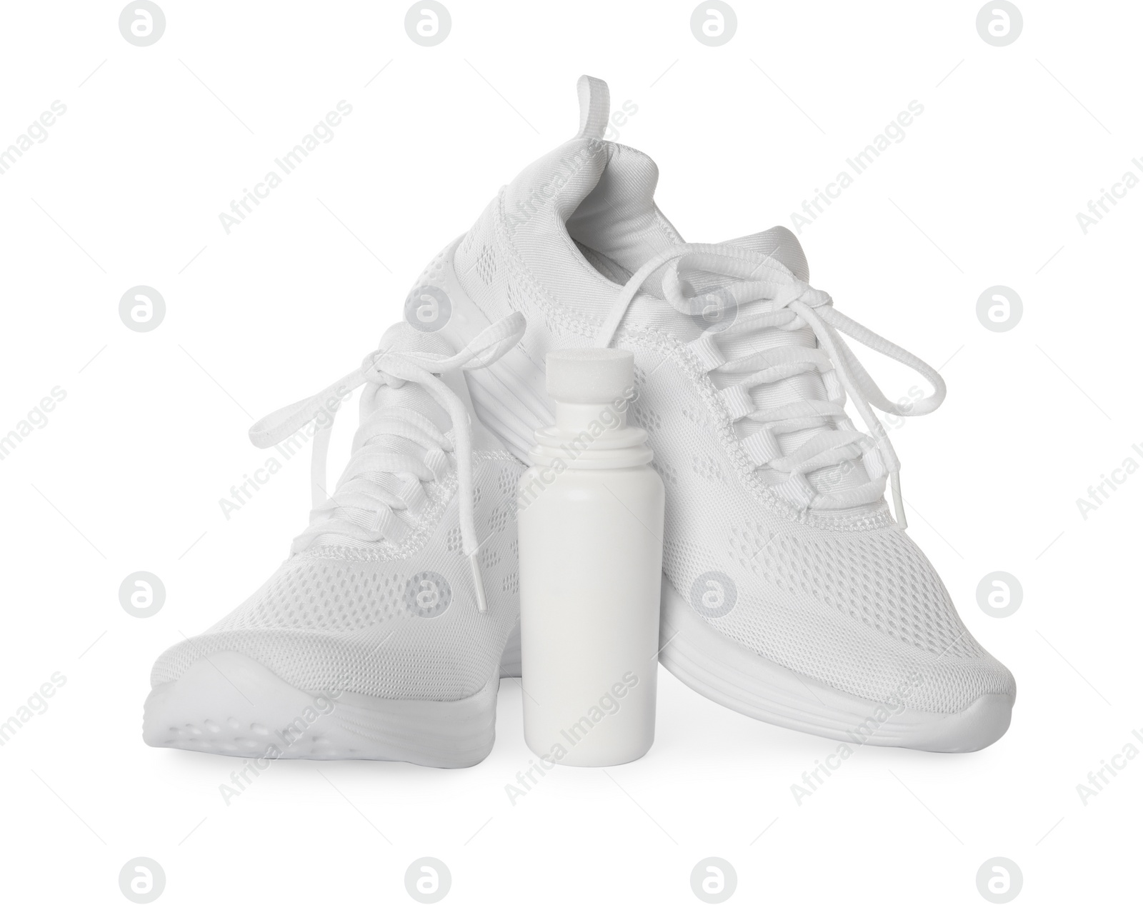 Photo of Stylish footwear and shoe care accessory on white background