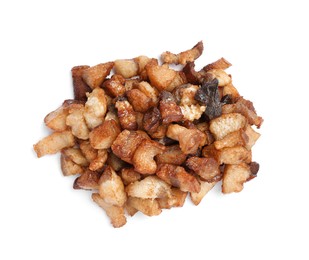 Tasty fried cracklings on white background, top view. Cooked pork lard