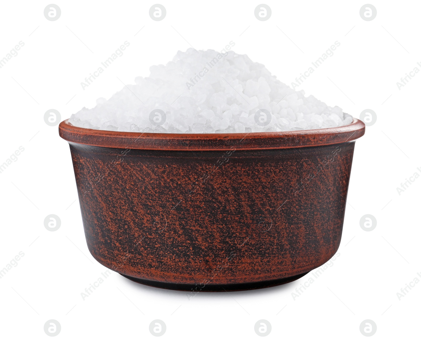 Photo of Ceramic bowl with natural sea salt isolated on white