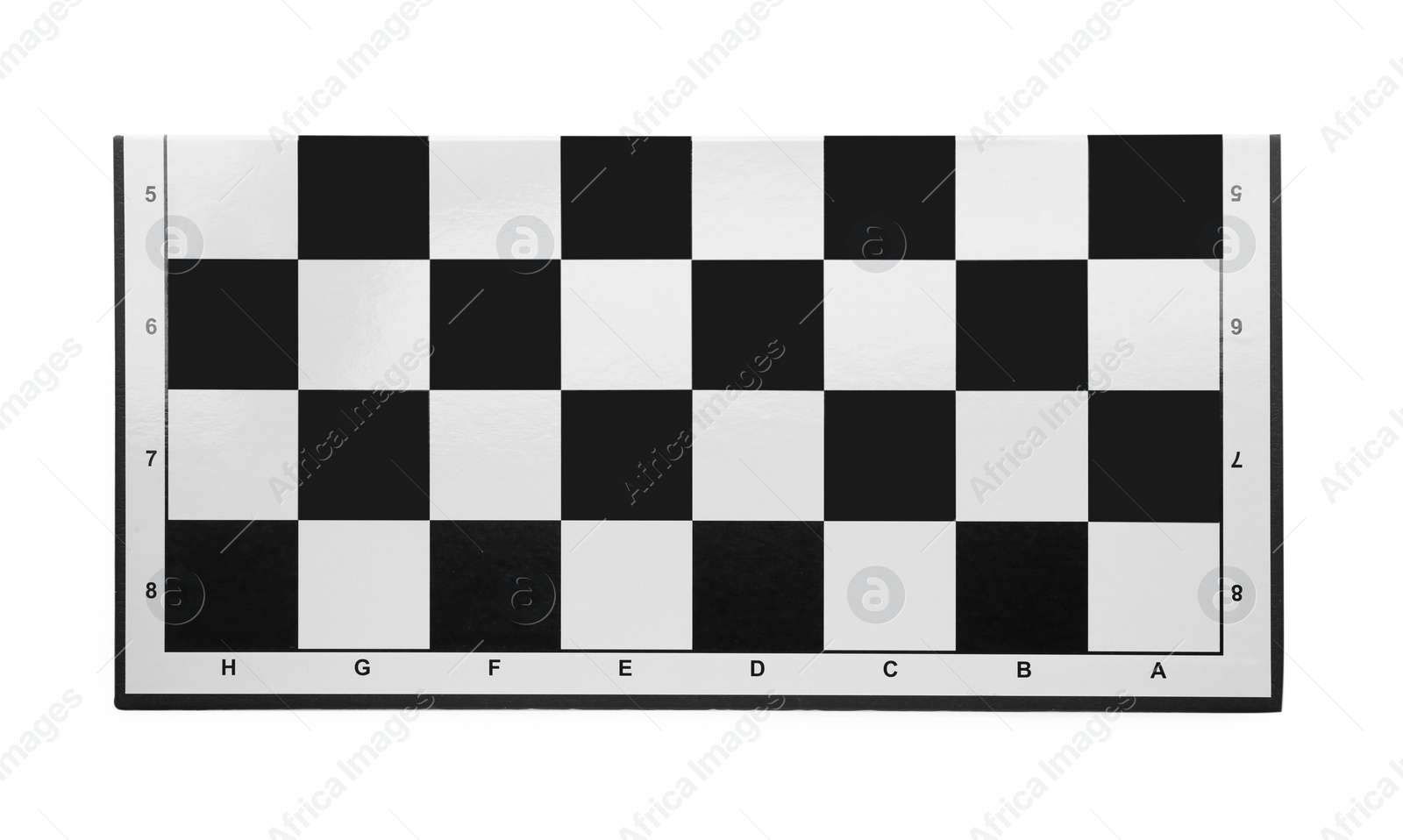 Photo of Empty checkerboard isolated on white, top view