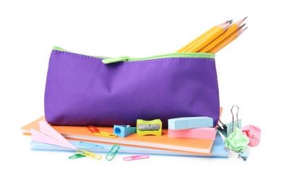 Pencil case and different school stationery on white background