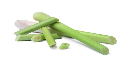 Photo of Fresh aromatic lemongrass stalks on white background