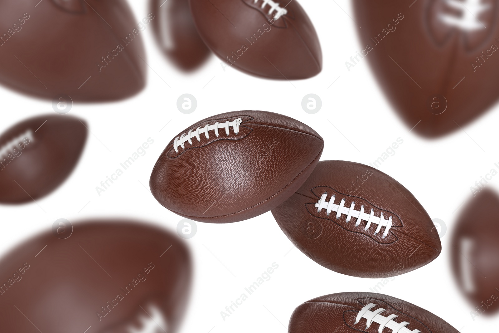 Image of Many American football balls flying on white background