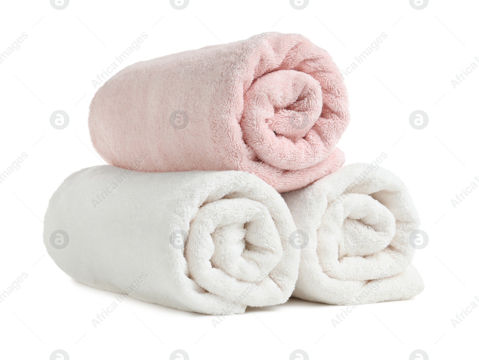 Photo of Rolled soft terry towels on white background