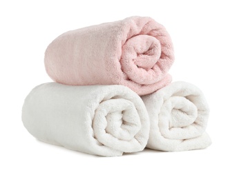 Rolled soft terry towels on white background