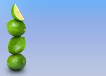 Image of Stacked whole and cut limes on color background, space for text