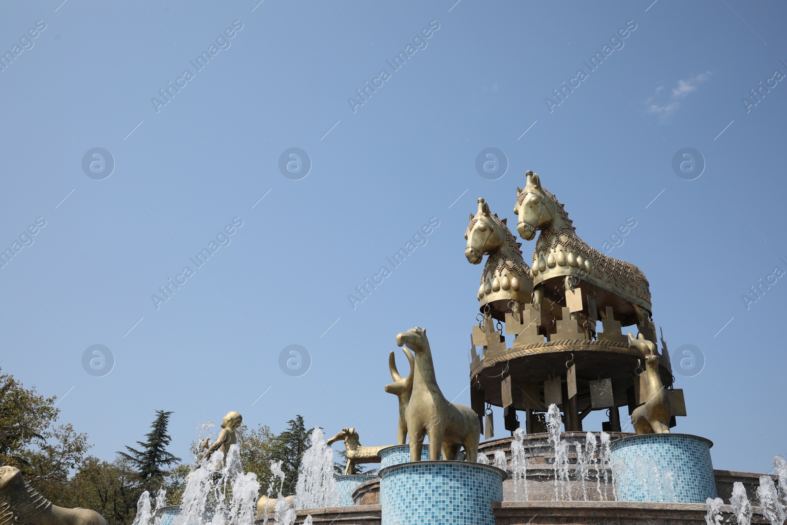 Photo of Kutaisi, Georgia - September 2, 2022: Picturesque view of beautiful Colchis fountain, space for text