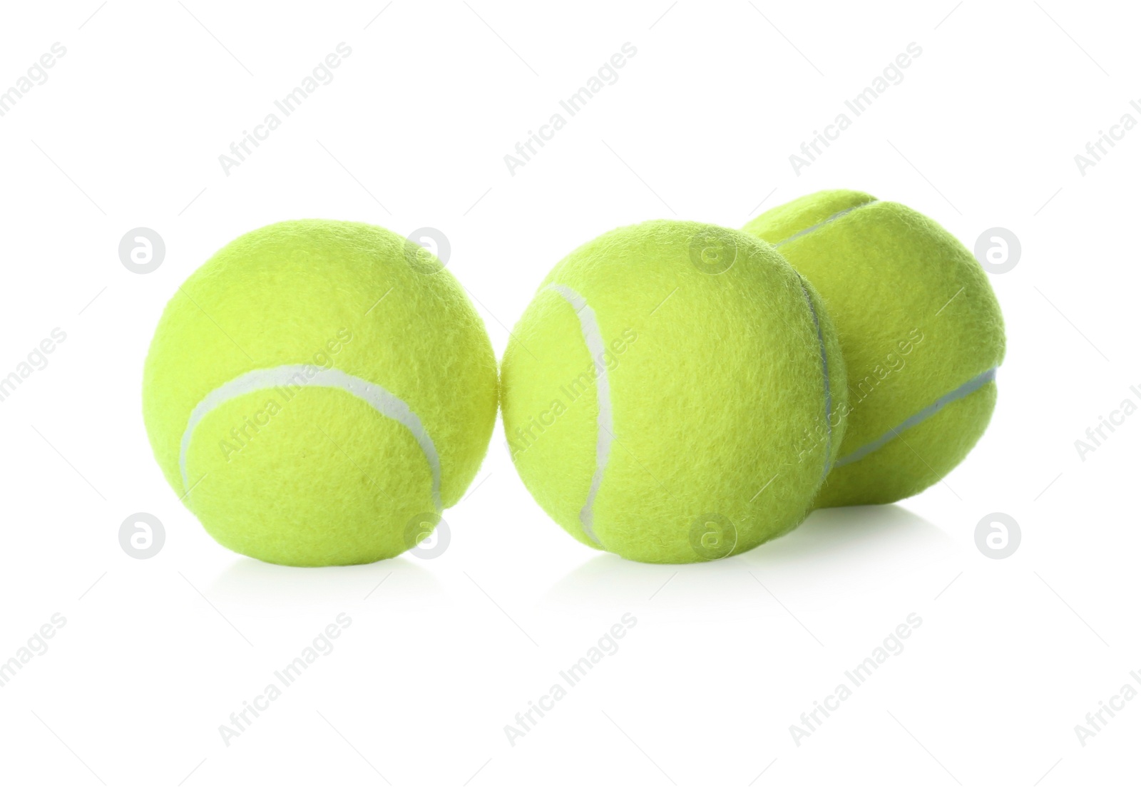 Photo of Tennis balls isolated on white. Sports equipment