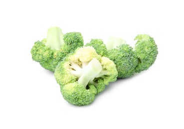 Photo of Fresh raw green broccoli isolated on white