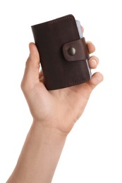 Photo of Man holding leather business card holder on white background, closeup