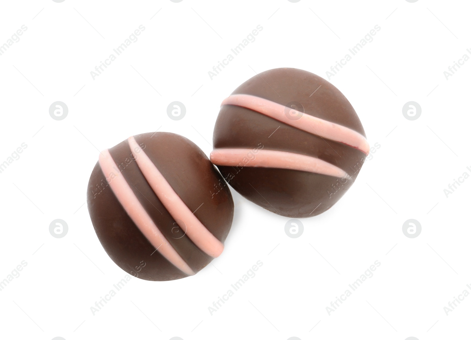 Photo of Delicious sweet chocolate truffles on white background, top view