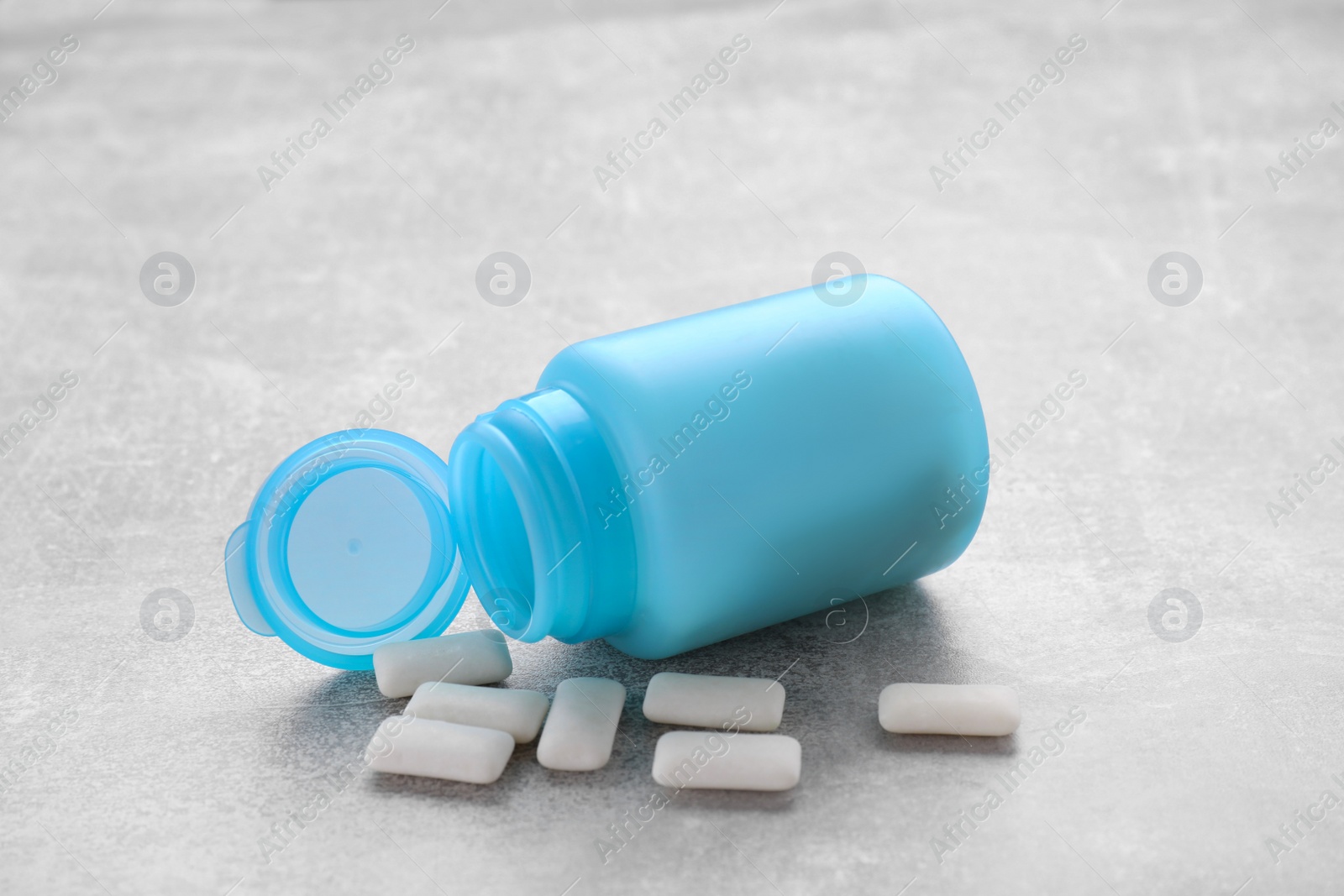 Photo of Jar with chewing gums on light table