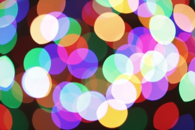 Photo of Beautiful colorful lights as background. Bokeh effect