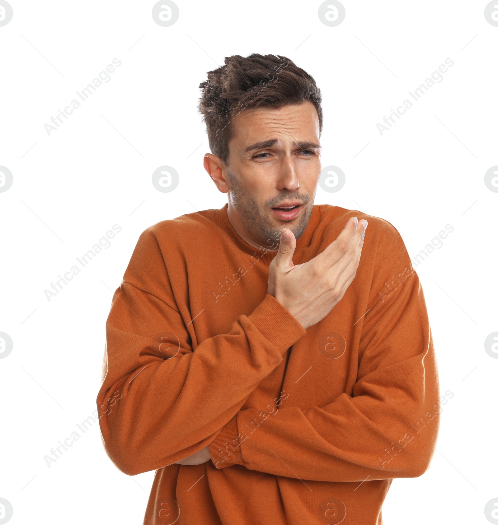 Photo of Young man suffering from cold on white background