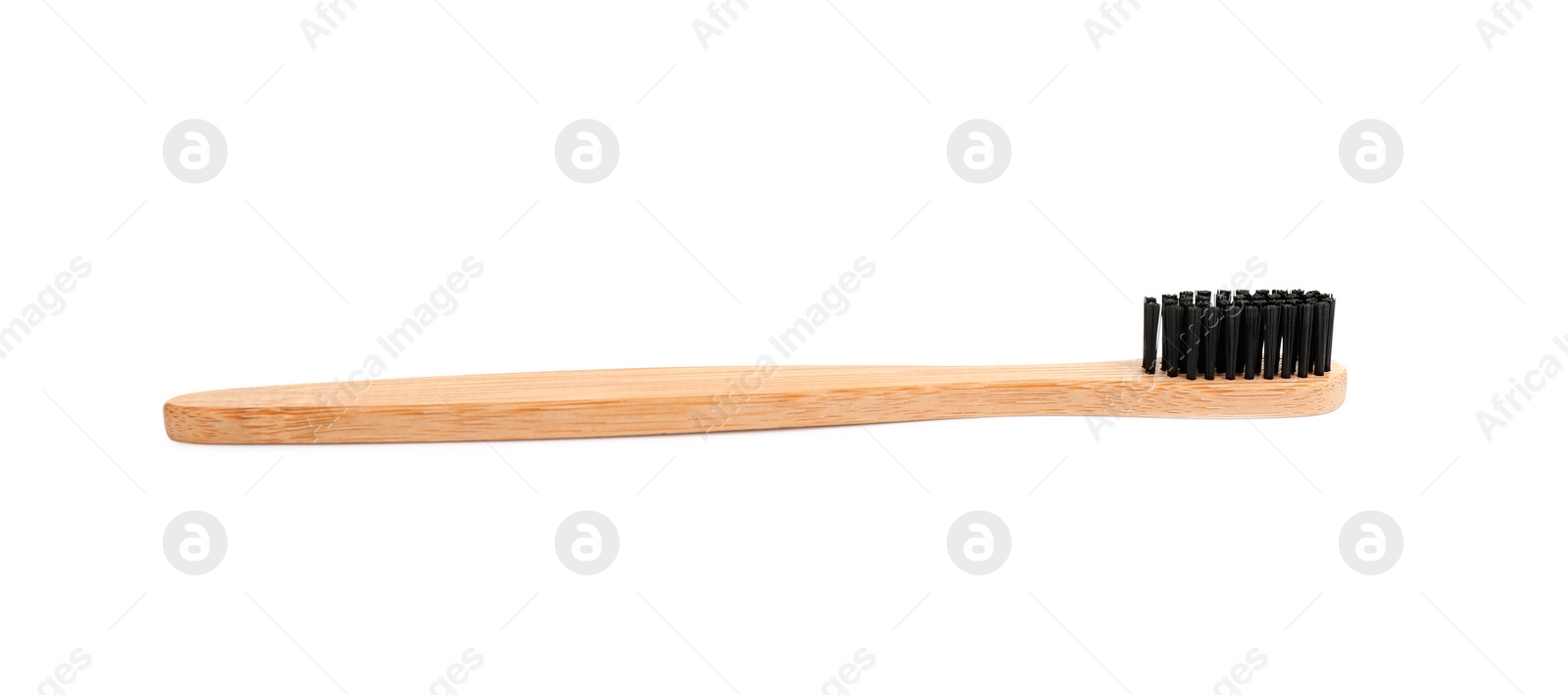 Photo of Bamboo toothbrush with charcoal bristle isolated on white